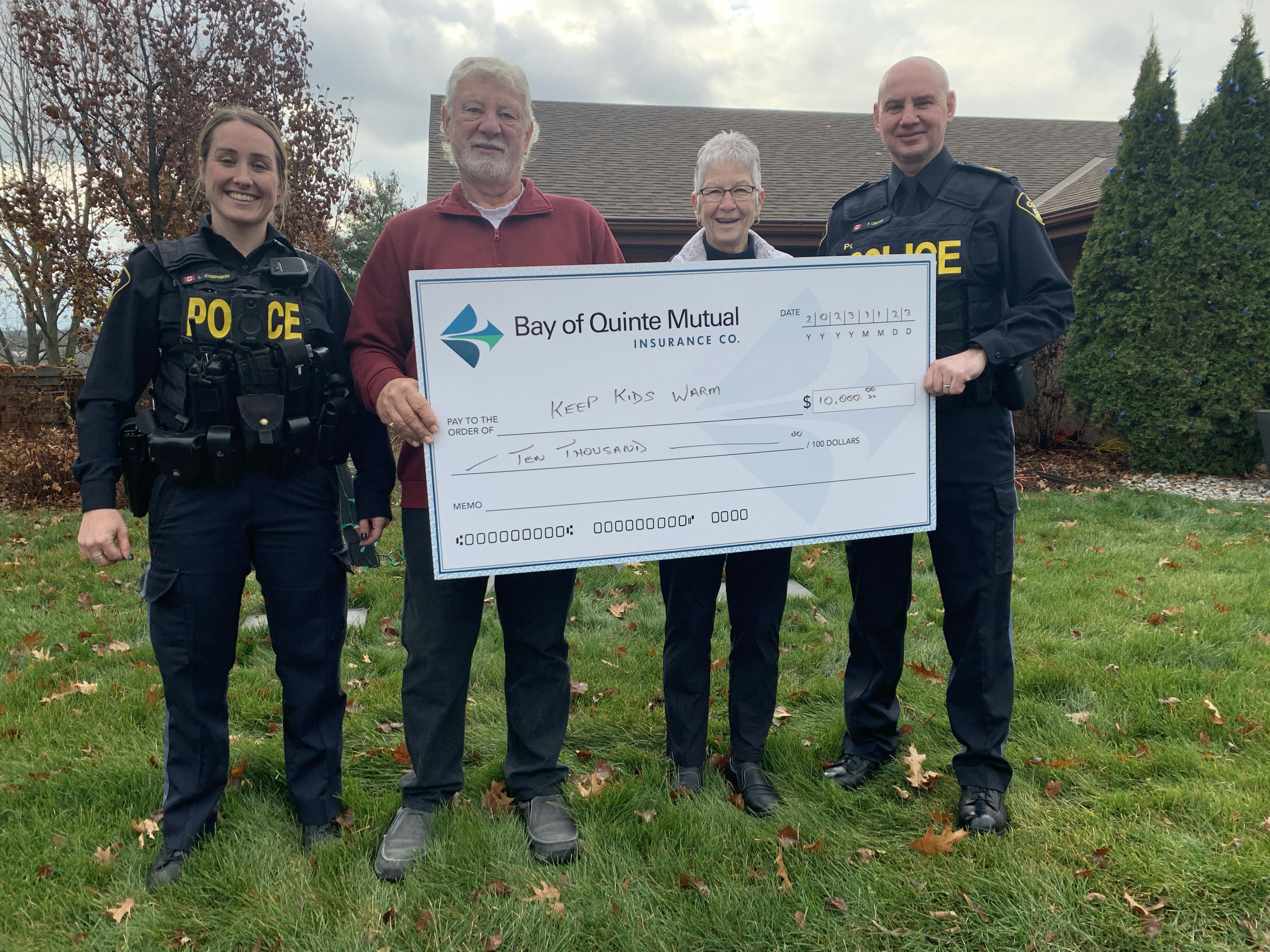 <p>Bay of Quinte Mutual Insurance presented the Keep Kids Warm campaign $10,000 for the 2024 program. Pictured from left are: OPP Constable Lori Josephson, Bay of Quinte&#8217;s Art Weirsma, program organizer Barb Sills and Sergeant Paul LeBlanc. (Jason Parks/Gazette Staff)</p>
