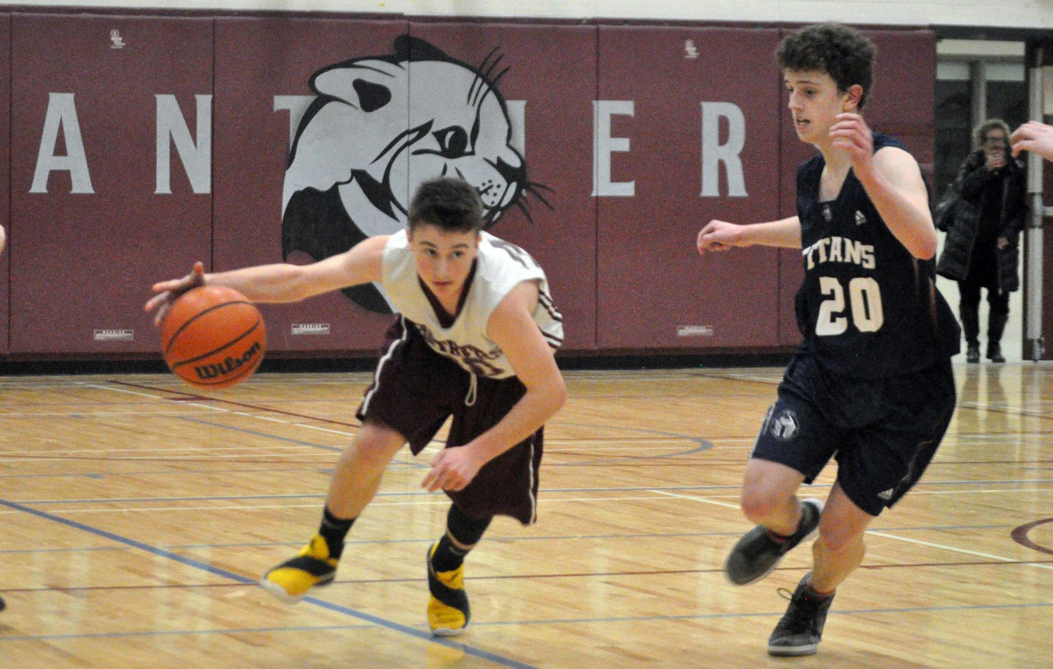 <p>On the run &#8211; PECI guard Ross Maycock attacks the sideline against St. Theresa Thursday evening. (Adam Bramburger/Gazette staff)</p>
